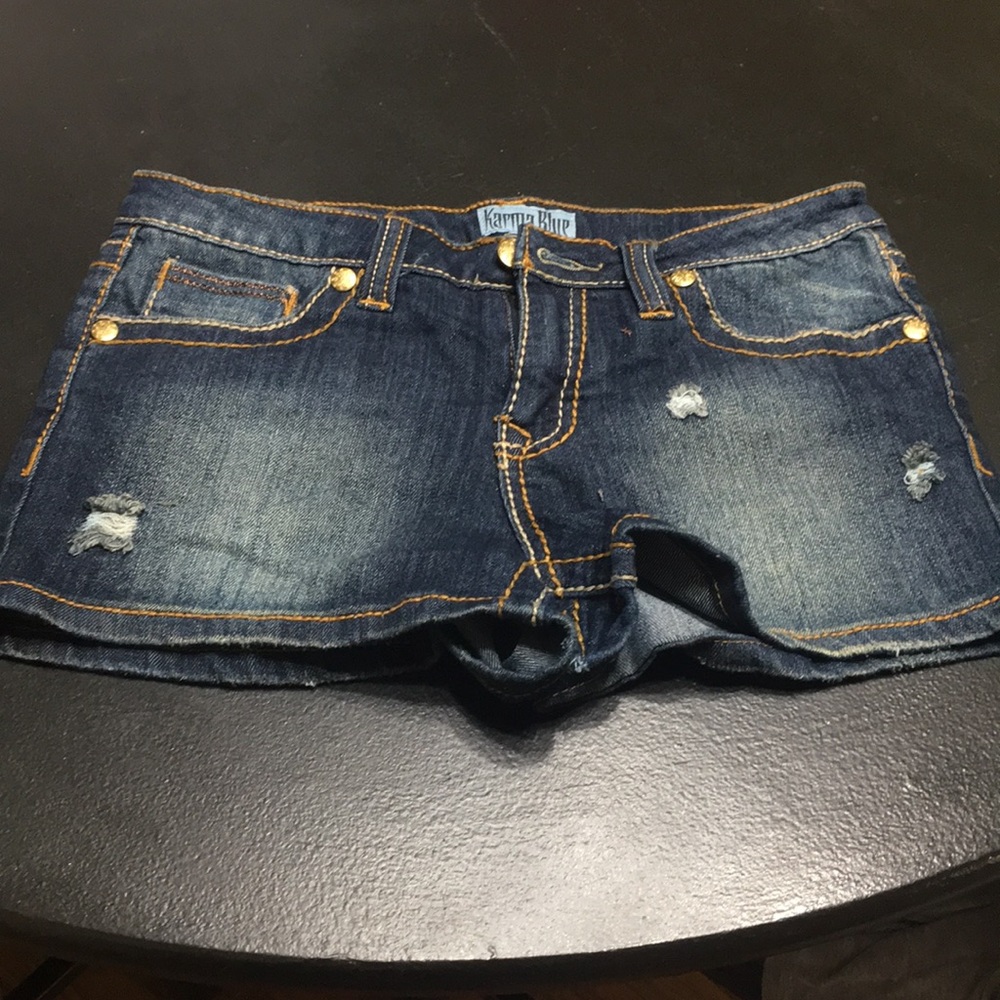 Distressed jean shorts